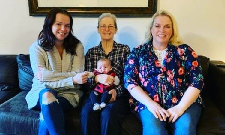An old picture of Madison Brown (left) with her grandmother, mother, and her daughter. 